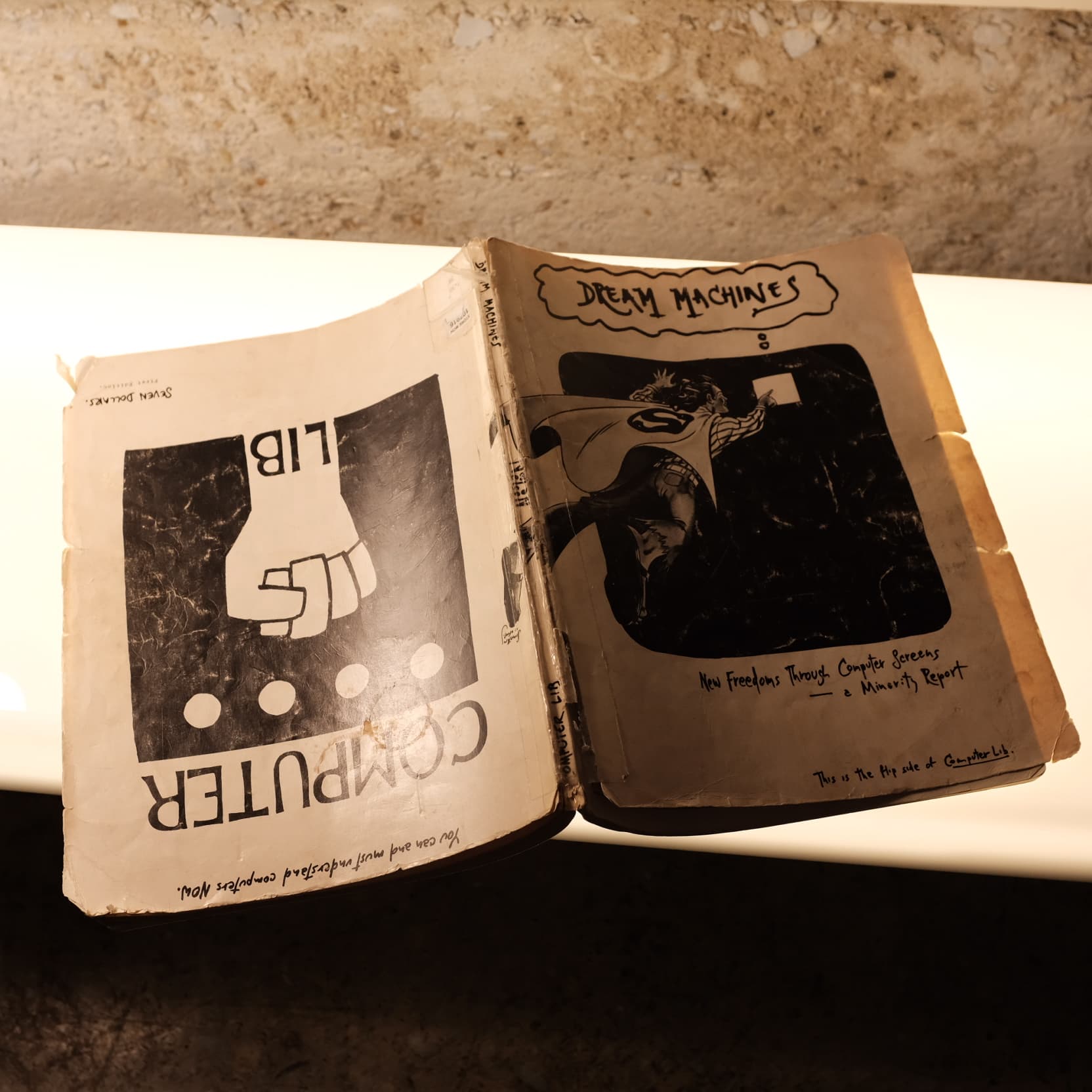 An old copy of Computer Lib/Dream Machines by Ted Nelson (1974).