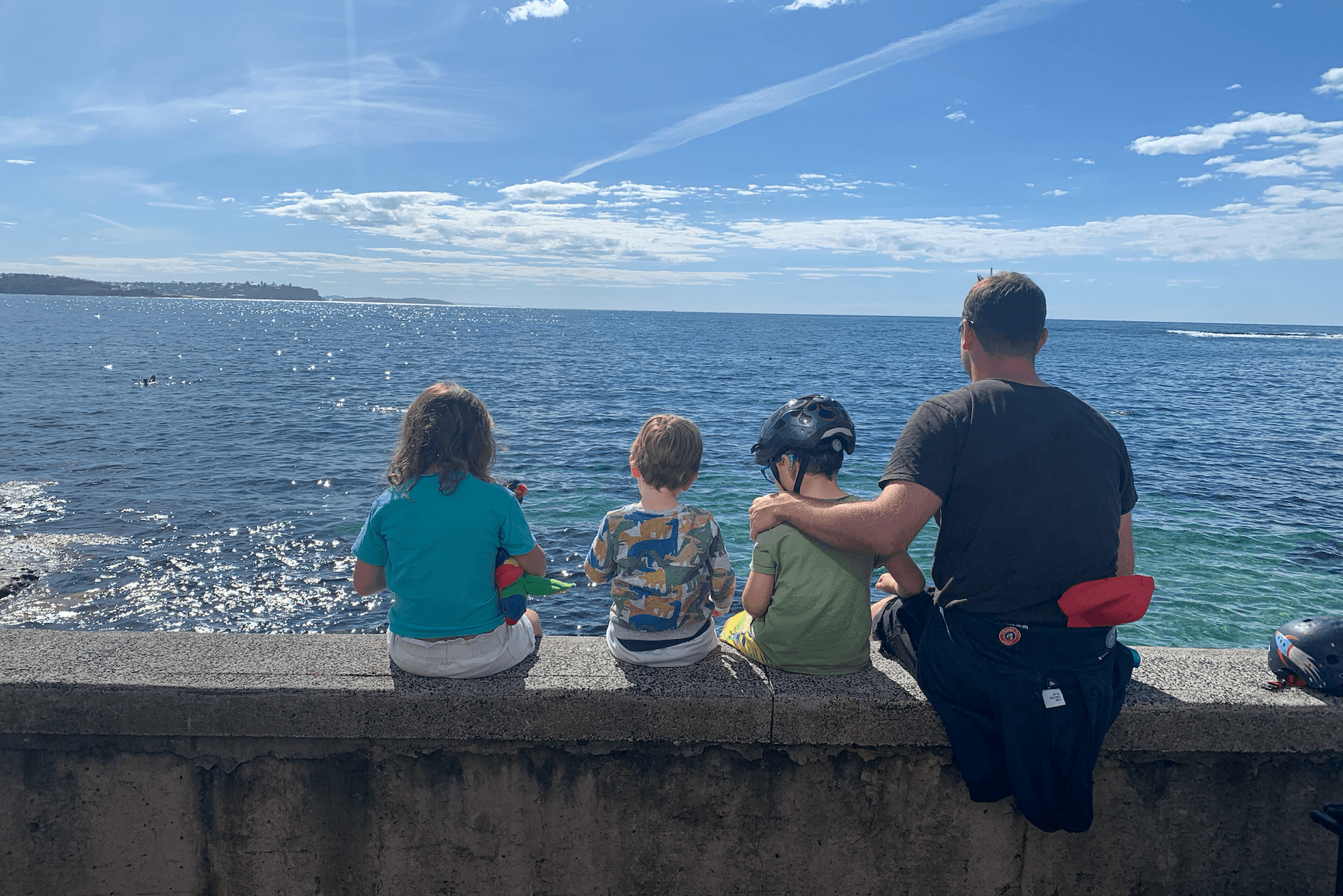 Taking in the ocean as a family.